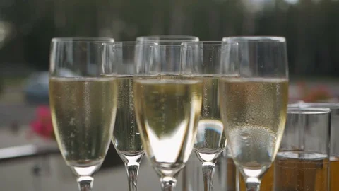 Champagne bubbles in a glass Stock Footage 93177423