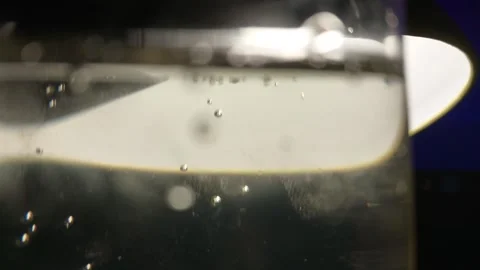 Champagne bubbles in a glass Видео 260232504