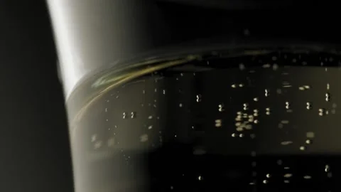 Champagne bubbles going up in super slow motion Stockbeeldmateriaal 149836357
