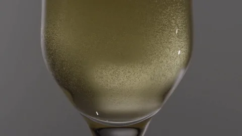 Champagne Bubbles Rising Closeup Stock Footage 76428176