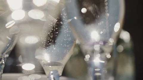Champagne glasses with bubbles close-up Stock Footage 240705020