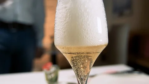 Champagne in glasses on restaurant table. Video stock 88191909