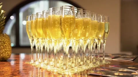 Champagne glasses on a table Видео 133805206