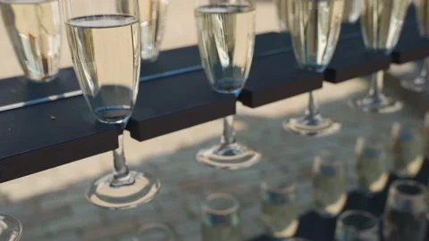 Champagne glasses on the table Stock Footage 149777889