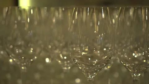 Champagne glasses on a table Stock Footage 232760744