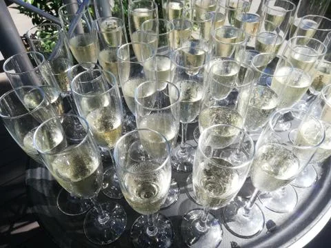 Champagne glasses on table Stock Photos