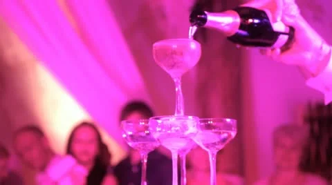 Champagne glasses tower serving Stock Footage 12141081