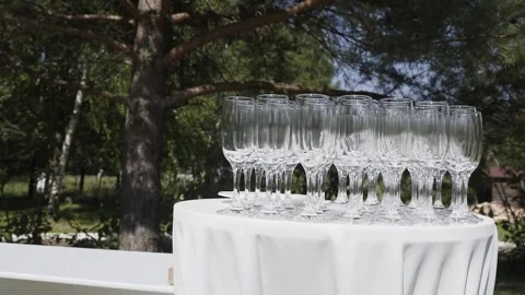 Champagne glasses on a white table Video stock 306148909