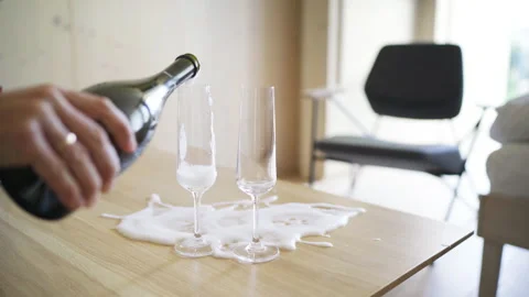 Champagne opening uncorking with splashing exploding wine bubbles Stock Footage 162844568