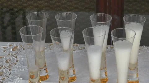 Champagne poured in glasses Video stock 11944208