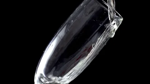 Champagne  pouring into glass in slow motion Video stock 75813790