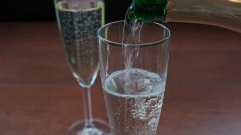 Champagne slow motion pour into glass. Stock Footage