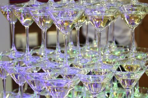 Champagne tower with four rows of glasses Stock Photos