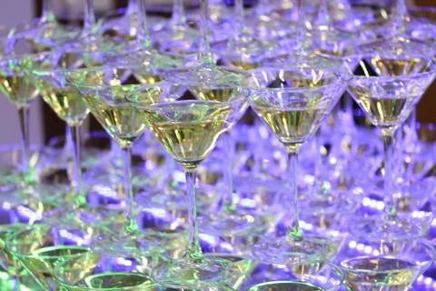 Champagne tower with four rows of glasses Stock Photos