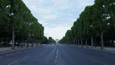 Champs-Elysees avenue empty in Paris with nobody and very few cars and Stock Footage 139990942