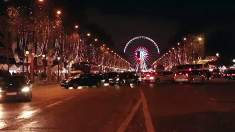 Champs Elysees at night and ferris wheel at horizon. Stock Footage 69225748