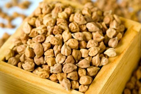 Chana brown gram seeds in rectangular wooden box vegetable Stock Photos