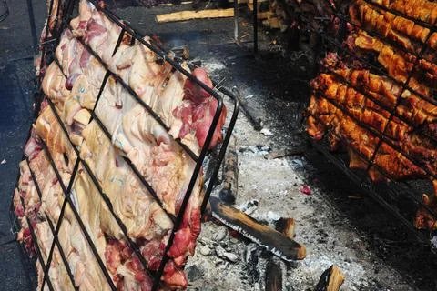 Chancho al palo ,barbecue grilled pig peruvian food Stock Photos