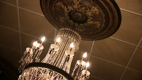 Chandelier on Brown Tile Ceiling Stock Footage 71156678