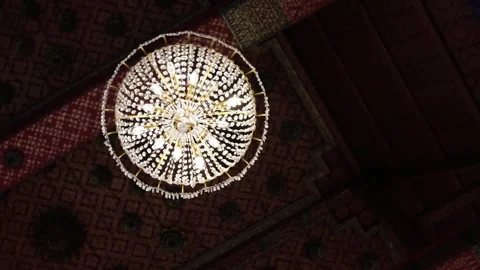 Chandelier hanging under the ceiling. Stock Footage 306574573