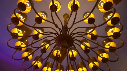 A chandelier hangs from the ceiling Stock Footage 197369883