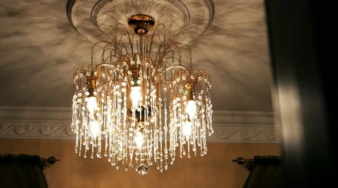 Chandelier illuminator on the ceiling, lighting in room Stock Footage 56792898