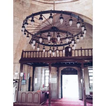 A chandelier inside from mosque Stock Photos