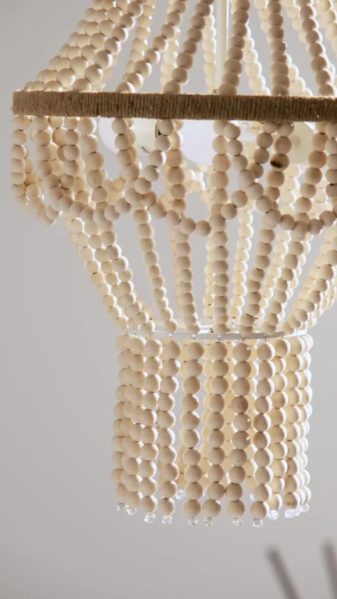 Chandelier in the kitchen of an expensive private villa in Dubai. Sunlight from Stock Footage 280307386