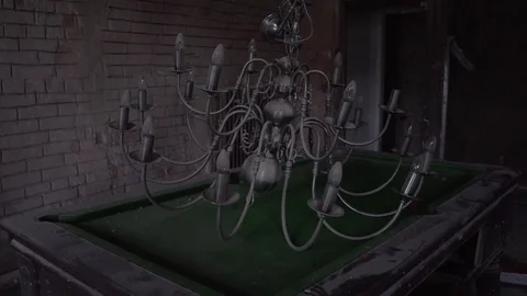 Chandelier on pool billiards table in old abandoned mansion stately home 스톡 동영상 101354583