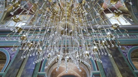 Chandelier in the temple in the sunset blue light Stock Footage 214017401