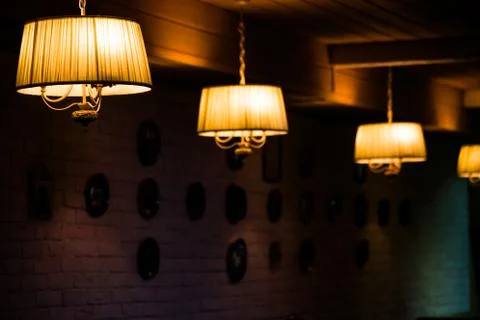 Chandeliers on the ceiling in a restaurant Фото