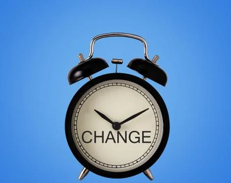 Change Concept on Clock on Blue Background Stock Photos