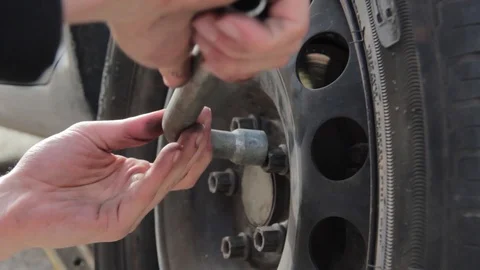Change a flat car tire Stock Footage 90814340