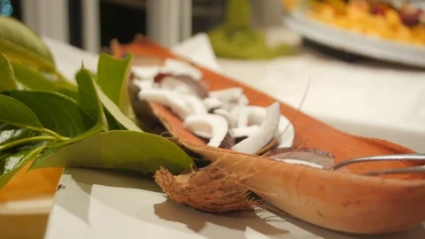 Change of focus on coconut in restaurant Stock Footage 97694716