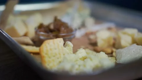 Change focus. Large cheese platter in a restaurant for weekend get-togethers Stock Footage 140962935