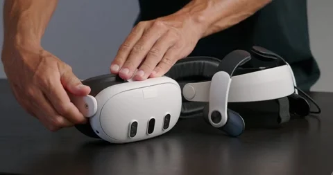 Change head strap for comfort on VR headset. Reduce facial stress. Stock Footage 280000119