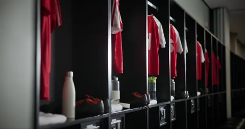 Change, interior and empty locker room with sport jersey, water bottle and 動画素材 280654656