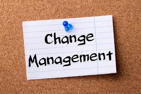 Change Management - teared note paper pinned on bulletin board Stock Photos