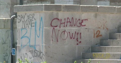 Change Now - BLM - Graffiti on Stone steps Stock Footage 135465947