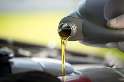 Change of oil during a car service Stock Photos
