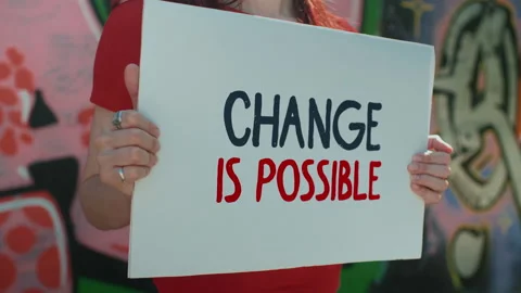 Change is possible, close up sign at poster, female protester against racism Vídeo Stock 133752498