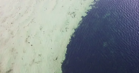 Change: Sand bottom and deep blue water Stock Footage 65128530