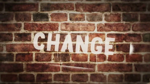 Change sign spray painted on the brick wall Stock Footage 150739748