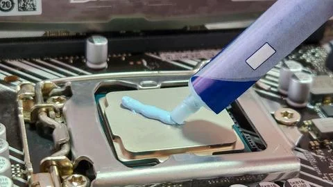 Change of thermal paste to PC processor. Stock Photos
