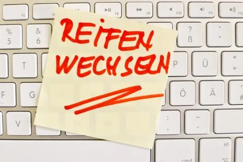 Change the tires: note on computer keyboard Stock Photos
