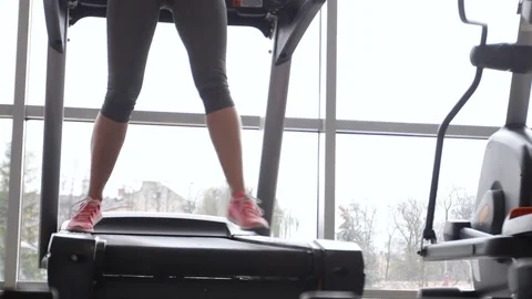 Change walking and running on treadmill in gym Stock Footage 81802214