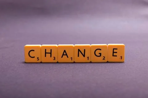 Change word written in plastic cube Stock Photos