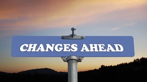 Changes ahead road sign with flowing clouds Stock Footage 40770462