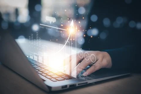 Changes in new planning, Hand using laptop with arrow business, start new yea Stock Photos