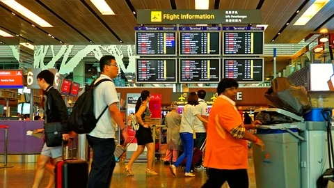 Changi airport, Singapore, July 2015 - Time lapse people in airport of Stock Footage